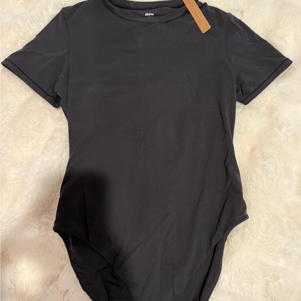 Skims body suit
